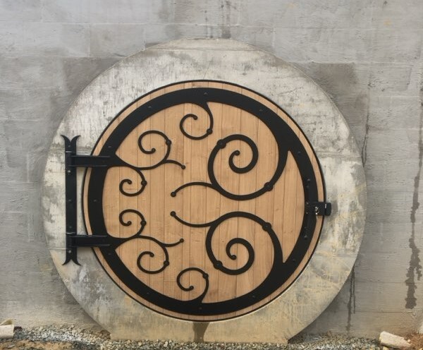 Porte de cave ronde, fabriquée comme celle de la maison des Hobbits